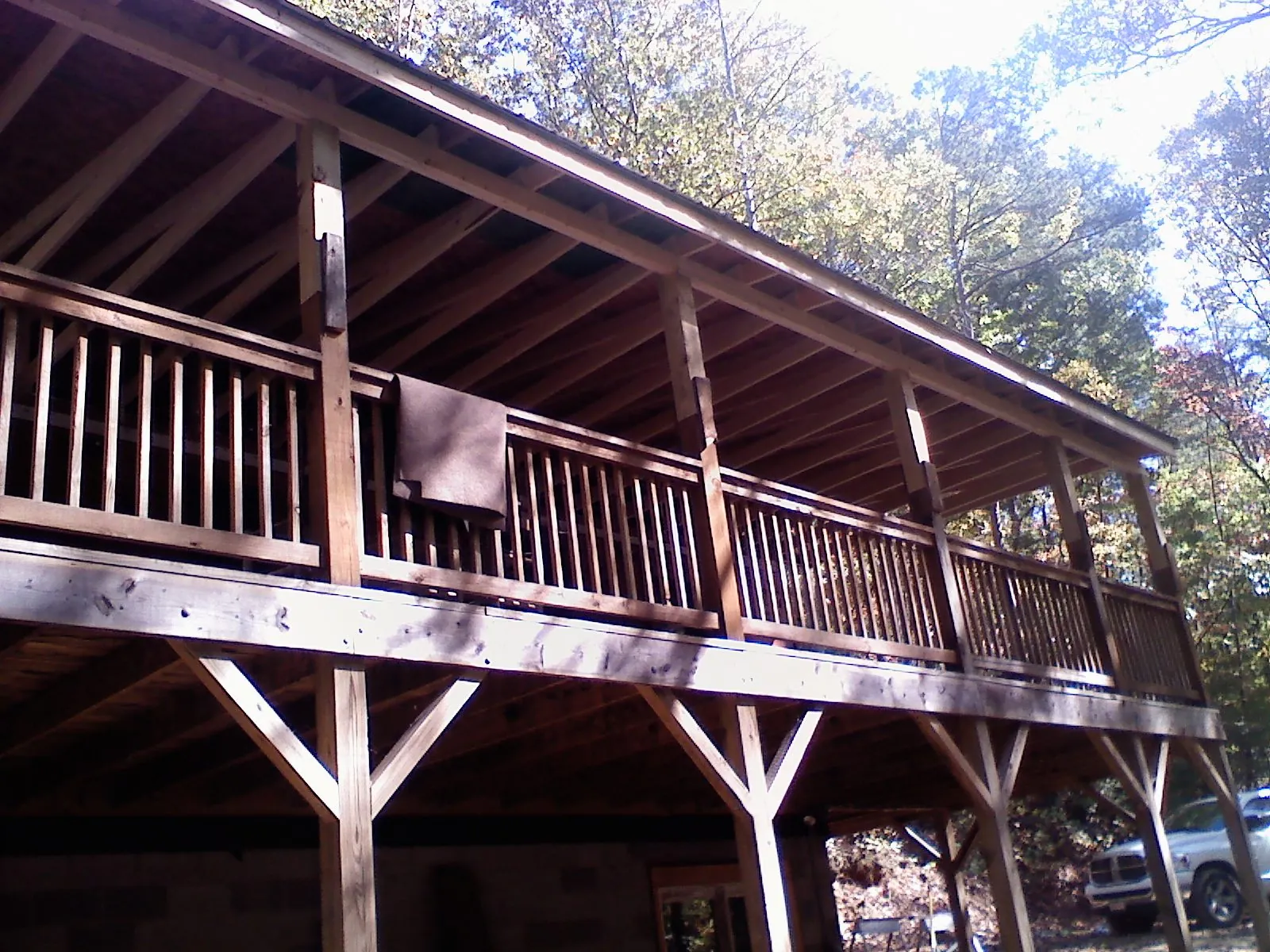 Timber framing under a new elevated porch and deck — Roof Leak Repair in Brownsville by Roofing Brothers